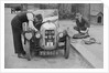 Working on the engine of E Martin's Austin Swallow at the North West London Motor Club Trial, 1929 by Bill Brunell