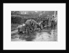 Attaching snow chains to JE Lancaster's Riley Brooklands during the Inter-Varsity Trial, 1930 by Bill Brunell