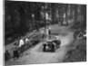Morris Minor taking part in the B&HMC Brighton-Beer Trial, Fingle Bridge Hill, Devon, 1934 by Bill Brunell