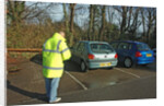 Car Park attendant recording car registration numbers by Unknown