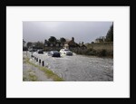 Vehicles on Flooded road at Beaulieu 2008 by Unknown