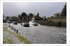Vehicles on Flooded road at Beaulieu 2008 by Unknown