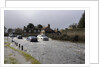 Vehicles on Flooded road at Beaulieu 2008 by Unknown