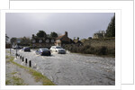 Vehicles on Flooded road at Beaulieu 2008 by Unknown