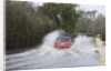 Rover Metro driving through floods at Beaulieu 2008 by Unknown