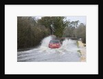Rover Metro driving through floods at Beaulieu 2008 by Unknown