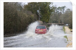 Rover Metro driving through floods at Beaulieu 2008 by Unknown