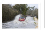 Rover Metro driving through floods at Beaulieu 2008 by Unknown