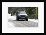 2001 Land Rover Freelander driving on icy road by Unknown