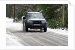 2001 Land Rover Freelander driving on icy road by Unknown