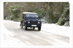 2002 Land Rover Defender driving on snowy road, 2009 by Unknown