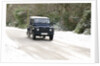 2002 Land Rover Defender driving on snowy road, 2009 by Unknown