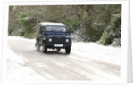 2002 Land Rover Defender driving on snowy road, 2009 by Unknown