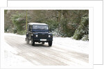 2002 Land Rover Defender driving on snowy road, 2009 by Unknown
