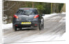 2009 Mazda 2 driving on snowy road by Unknown