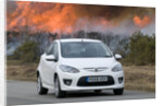 2010 Mazda 2 Sport, controlled burning in New Forest by Unknown