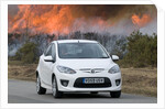 2010 Mazda 2 Sport, controlled burning in New Forest by Unknown
