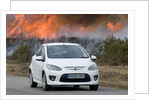 2010 Mazda 2 Sport, controlled burning in New Forest by Unknown