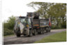 Road resurfacing work repairing potholes by Unknown