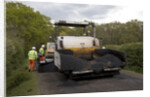 Road resurfacing work repairing potholes by Unknown