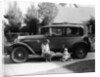 Stan Laurel at the wheel of 1927 Hupmobile with his wife Lois and daughter Lois by Unknown