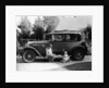 Stan Laurel at the wheel of 1927 Hupmobile with his wife Lois and daughter Lois by Unknown
