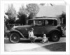 Stan Laurel at the wheel of 1927 Hupmobile with his wife Lois and daughter Lois by Unknown