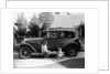 Stan Laurel at the wheel of 1927 Hupmobile with his wife Lois and daughter Lois by Unknown