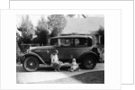 Stan Laurel at the wheel of 1927 Hupmobile with his wife Lois and daughter Lois by Unknown