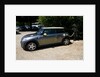 Electric Mini at battery charging point 2011 by Unknown