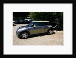 Electric Mini at battery charging point 2011 by Unknown