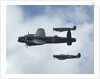 2011 Goodwood Revival Meeting, Lancaster bomber and 2 Spitfires in aerial display by Unknown