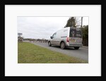 Group of donkeys crossing road and holding up traffic in New Forest 2011 by Unknown