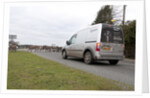 Group of donkeys crossing road and holding up traffic in New Forest 2011 by Unknown