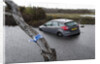 Ford Focus in flooded ditch after losing control on wet road 2012 by Unknown