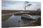 Ford Focus in flooded ditch after losing control on wet road 2012 by Unknown