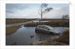 Ford Focus in flooded ditch after losing control on wet road 2012 by Unknown