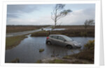 Ford Focus in flooded ditch after losing control on wet road 2012 by Unknown
