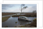 Ford Focus in flooded ditch after losing control on wet road 2012 by Unknown