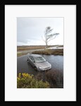 Ford Focus in flooded ditch after losing control on wet road 2012 by Unknown