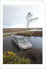 Ford Focus in flooded ditch after losing control on wet road 2012 by Unknown