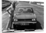 1969 Hillman Hunter GT with female model by Unknown