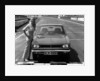 1969 Hillman Hunter GT with female model by Unknown