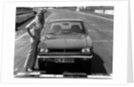 1969 Hillman Hunter GT with female model by Unknown