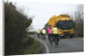 Group of cylists encounter refuse truck on country road in New Forest 2014 by Unknown