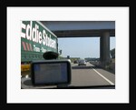 Passing Eddie Stobart truck on the A46 with satnav screen on windscreen by Anonymous