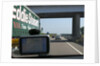 Passing Eddie Stobart truck on the A46 with satnav screen on windscreen by Anonymous
