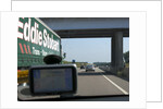 Passing Eddie Stobart truck on the A46 with satnav screen on windscreen by Anonymous