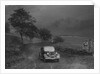 Ford V8 saloon of WS Millar competing in the MCC Sporting Trial, 1935 by Bill Brunell