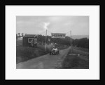 Car crossing the finishing line at the MAC Shelsley Walsh Speed Hill Climb, Worcestershire, 1935 by Bill Brunell